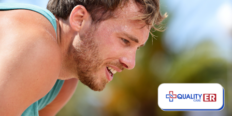 man hot sweating during summer overheating and dehydrated wearing a blue tank top